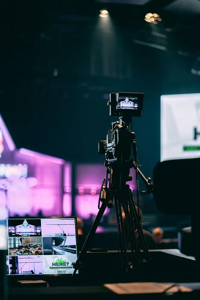 A professional video camera at a live event